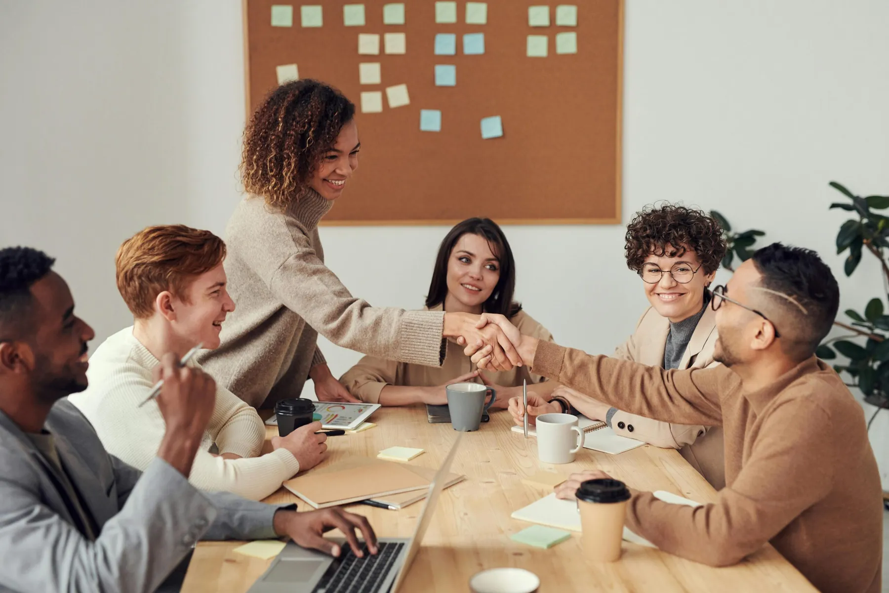 Creative team collaborating around a table